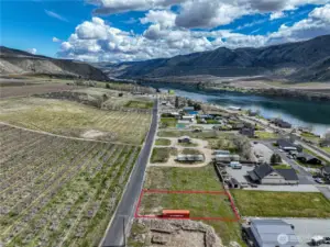 Boundary lines Approximate. Red Storage Container and trailers on two lots to left to be removed soon.