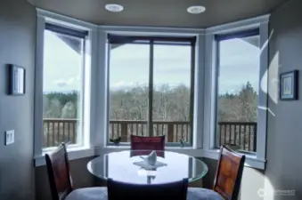 Breakfast nook just off the kitchen to dine and enjoy the views outside