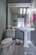 Half bath just across the hall from the office/den