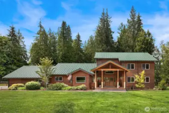 Welcome to this custom cedar-built home tucked away in the heart of Redmond on 7 private acres.