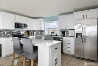 Newly remodeled kitchen. light and bright and open to the main living area.