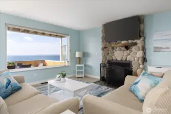 Relax in front of your cozy fire place  while watching the waves gently roll in.
