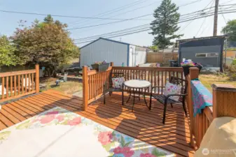 Inviting outdoor deck with backyard views.
