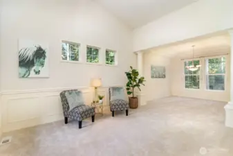 Bright, open concept living & dining rooms.