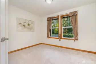 Main floor office features French doors.