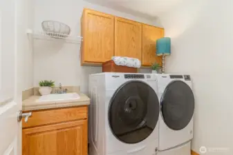 Upstairs laundry room is conveniently located near the bedrooms.
