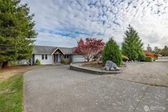 Privately tucked away from the road with ample parking