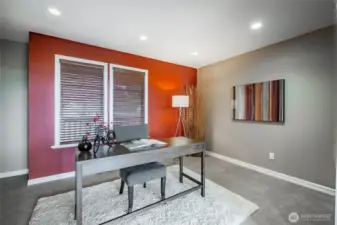 French doors open to this oversized den
