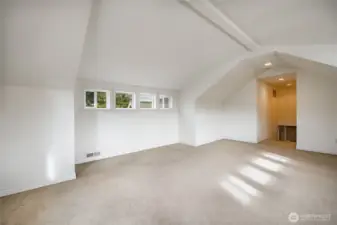 Upstairs loft is HUGE and could be used as a flex room, work out space or media room