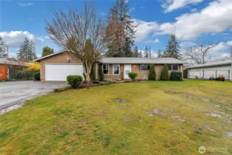 Spacious front yard with RV parking