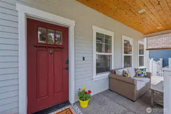Covered front porch perfect for morning coffee