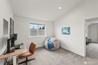 Upstairs flex space for living/working/game time, and access to full bath and two more bedrooms