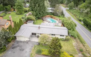 Large corner lot. Property goes beyond fence line in back