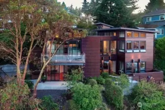Home faces the harbor with glorious views overlooking Seattle Yacht Club.  A multi facit estate designed by Anna Howden, Architect. Received a LEED Certification for environmental design and efficiency.