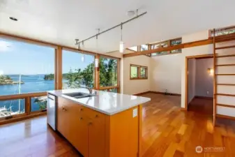 Guest apartment has kitchen, living room, bedroom plus a loft above bedroom and a 3/4 bath.