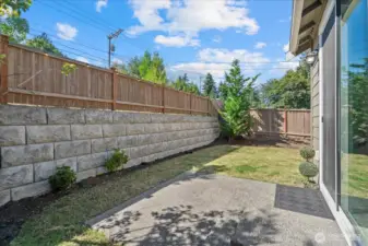 Fully Fenced Backyard with Patio Area