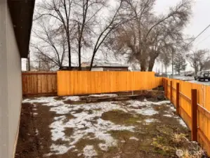 Large side yard next to garage