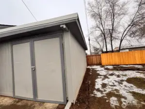 Garage and side yard.