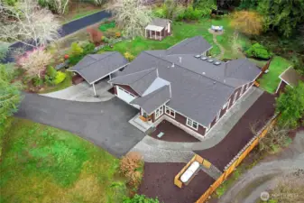 Home sits on a sunny and level shy acre. New Roof, new exterior paint, and extensive hardscaping is fresh and simple. Tabula rasa for your own spring plantings!