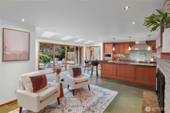 Cozy central propane fireplace and skylights to bring in light.