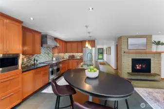 French Top Wolf range in the chef’s kitchen and straight grain fir cabinets.