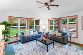 Back garden as seen through the many fir trimed windows.