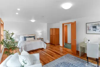 Oregon myrtle hardwood floors in both bedrooms.