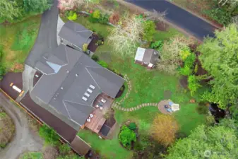 Fire pit area, garden outbuildings.