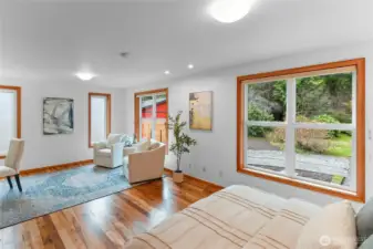 Sitting area adjacent to office desk.