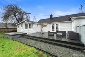 Deck and expansive backyard