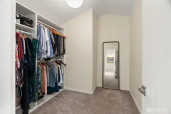 Primary walk-in closet.