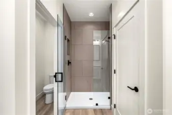 Spacious walk-in shower with tile surround