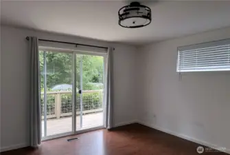 Master bedroom with sliding doors onto deck