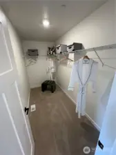 Primary walk-in closet of model home. Finishes and features may vary.