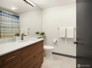 Full bathroom adjacent to the second bedroom.