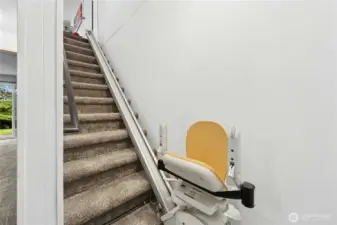 Stairs to downstairs. Electric chair can stay or Seller can remove-Buyer's choice!