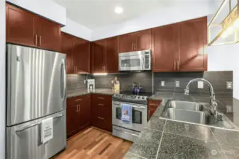 Bright kitchen with all stainless appliances