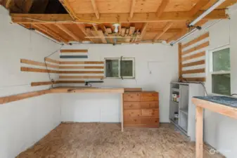 Here's the inside of the shed/shop. Storage up above and nice working space down below.