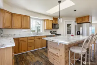 Skylight brings light into kitchen.