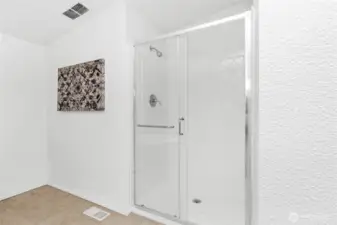 New shower with glass enclosure...