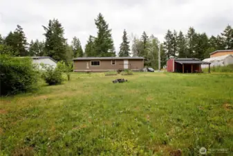 Lot size is .97 acres; shed and lean to included.