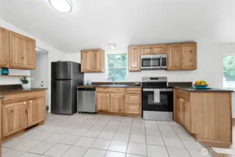 Good sized kitchen would be roomy enough to add a mobile "island" if desired.