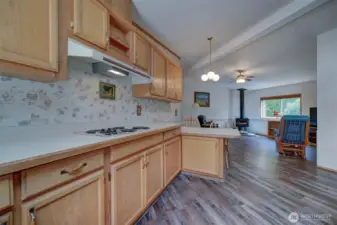 The cook easily feels connected to activities in adjacent rooms.