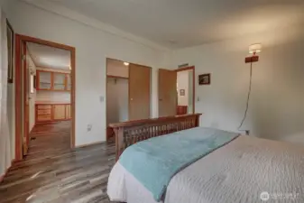 The principle bedroom enjoys a deep generous walk-in closet and adjoining bathroom.