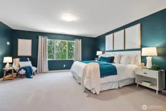 The spacious primary suite includes a walk-in closet and a luxe ensuite that feels like your own personal retreat