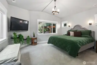 Primary suite is a dream, looking out onto the zen like setting in the backyard.