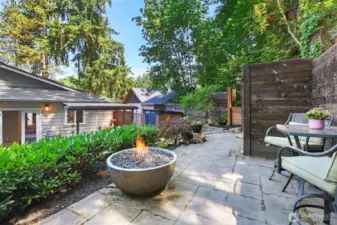 Several different areas to hang out in the backyard area.