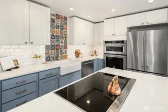Newer luxury appliances. Induction stove. Double oven. Built-in microwave. Even an instant hot water dispenser!