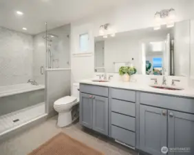 Calling this a "bathroom" is a disservice. The spa-like space, next to the primary bedroom, has a heated floor, double shower heads and sinks, exquisite tile work, imported ceramic sinks, and a HYDRO SYSTEM soaking tub. Learn about Hydro Fusion - https://hydrosystem.com/bath-tub-options/hydro-fusion/