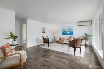 The bright and spacious living room is so inviting.